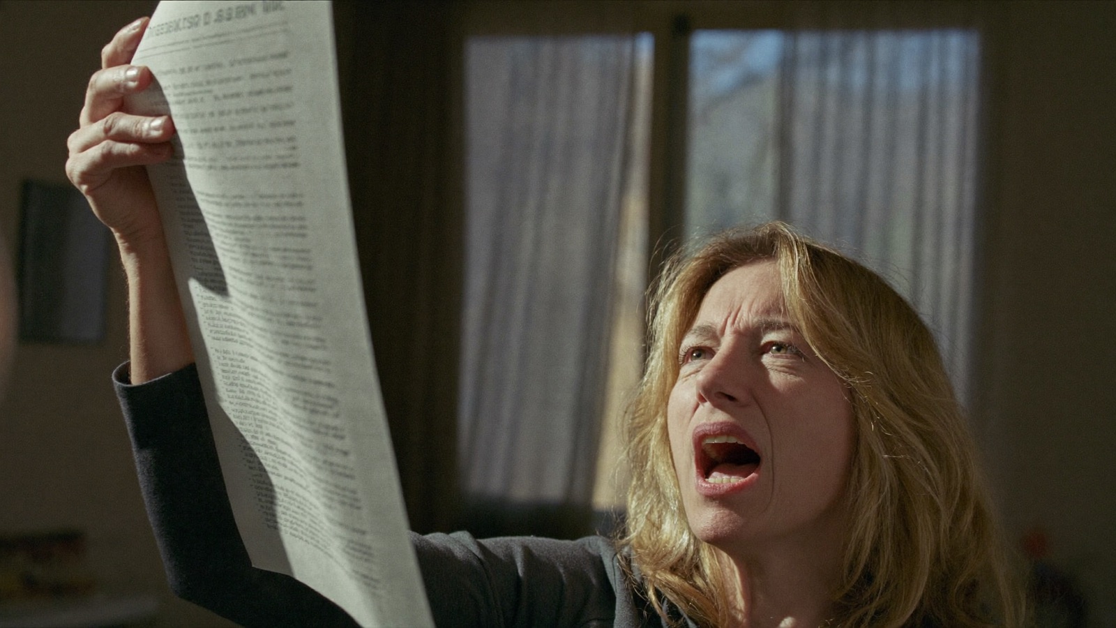 A frustrated woman holding her lab results